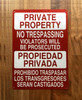 FD PRIVATE PROPERTY NO TRESPASSING VIOLATORS WILL BE PROSECUTED BILINGUAL SIGN
