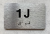FD APT NUMBER 1J SIGN-UNIT NUMBER SIGN WITH RAISED LETTERS