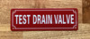 TEST DRAIN VALVE COMPLIANCE SIGN