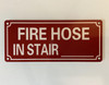NYC FIRE HOSE IN STAIR BLANK SIGN