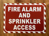 FIRE ALARM AND SPRINKLER ACCESS COMPLIANCE SIGN -ZEBRA LINE