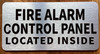 The Fire Alarm Control Panel Located Inside Safety Sign