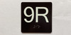 9R Elevator Jamb Plate Compliance Sign