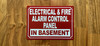 red-electrical-and-fire-alarm-control-panel-in-basement-screw-mount-sign.jpg