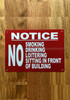 notice-no-smoking-drinking-loitering-sitting-in-front-of-building-aluminum-with-mounting-holes.jpg