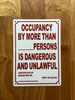 occupancy-by-more-than-persons-is-dangerous-and-unlawful-aluminum-with-mounting-holes.jpg