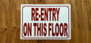 white-re-entry-on-this-floor-screw-mount-sign.jpg