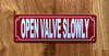 red-open-valve-slowly-screw-mount-sign.jpg