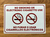 no-smoking-or-electronic-cigarette-use-sign-spanish-english-screw-mount-identification.jpg