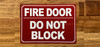 fire-door-do-not-block-sign-red-equipment-notice.jpg