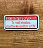 firefighter-operation-to-recall-elevators-red-white-facility-notice.jpg