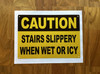 yellow-caution-stairs-slippery-when-wet-or-icy-screw-mount-sign.jpg