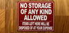 red-no-storage-of-any-kind-allowed-screw-mount-sign.jpg