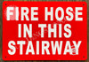 FIRE Hose in This Stairway Hotel Sign FIRE Hose in This Stairway Hotel Sign