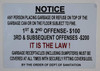 Notice: Any Person Placing Garbage on top of The Garbage can or on The Floor Subject to fine  Building Sign