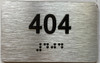 ADA APARTMENT NUMBER 404 SIGN