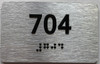 ADA APARTMENT NUMBER 704 SIGN