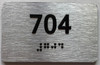 HOTEL ADA APARTMENT NUMBER 704 SIGN