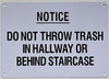 NOTICE: DO NOT THROW TRASH IN HALLWAY OR BEHIND STAIRCASE