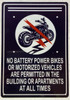 No battery power bikes or motorized vehicles are permitted in the building or apartments at all times  Hotel Sign