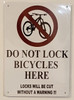 DO NOT LOCK BICYCLE HERE LOCKS WILL BE CUT WITHOUT A WARNING DO NOT LOCK BICYCLE HERE LOCKS WILL BE CUT WITHOUT A WARNING