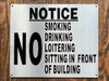 NO SMOKING DRINKING LOITERING SITTING IN FRONT OF BUILDING BUILDING SIGN NO SMOKING DRINKING LOITERING SITTING IN FRONT OF BUILDING BUILDING SIGN