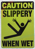 CAUTION: SLIPPERY WHEN WET SAFETY SIGN