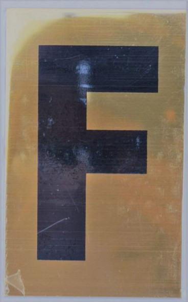 Apartment number sign F Apartment number sign F