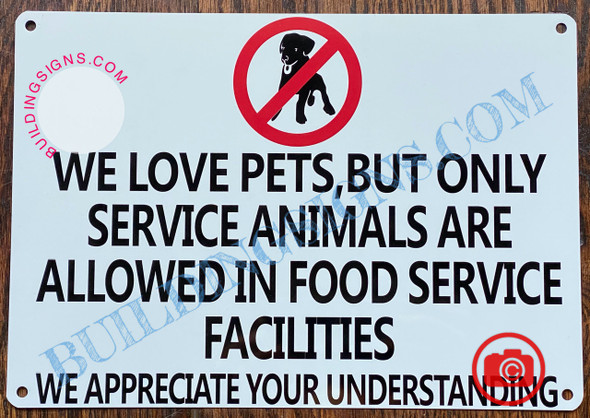 WE LOVE PETS BUT ONLY SERVICE ANIMALS ARE ALLOWED IN FOOD SERVICE FACILITIES SIGN- WHITE