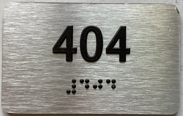 ADA APARTMENT NUMBER 404 SIGN