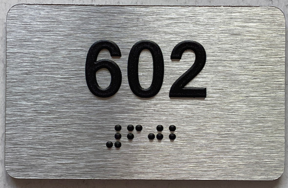 ADA APARTMENT NUMBER 602 SIGN