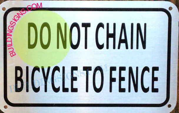 DO NOT CHAIN BICYCLE TO FENCE SIGN- DO NOT CHAIN BICYCLE TO FENCE SIGN-