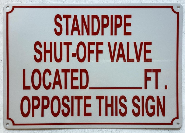 STANDPIPE SHUT OFF VALVE LOCATED FEET OPPOSITE THIS SIGN SIGN