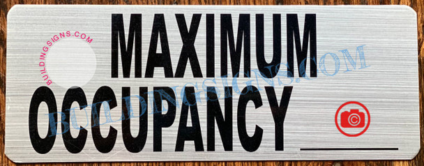 MAXIMUM OCCUPANCY  BRUSHED ALUMINUM