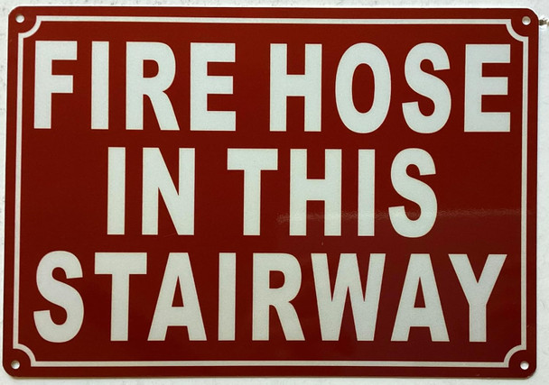 FIRE HOSE IN THIS STAIRWAY