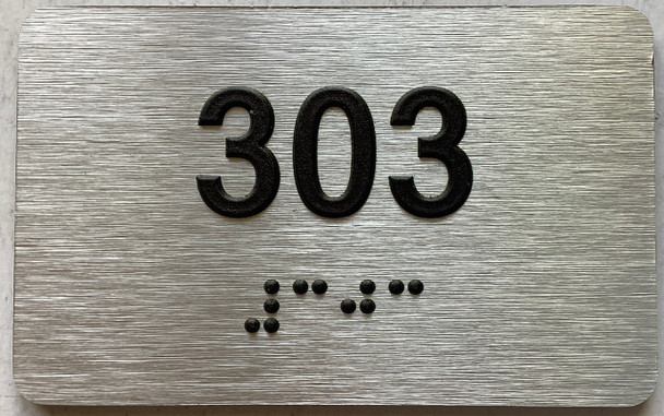 ADA APARTMENT NUMBER 303 SIGN
