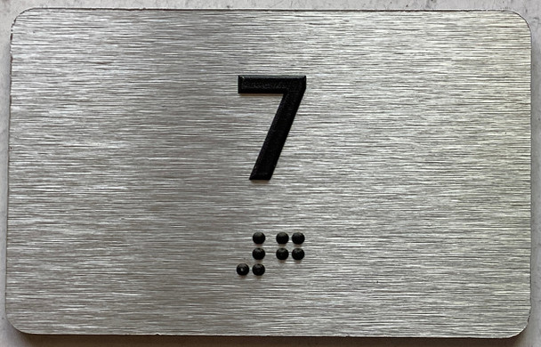 ADA APARTMENT NUMBER 7 SIGN