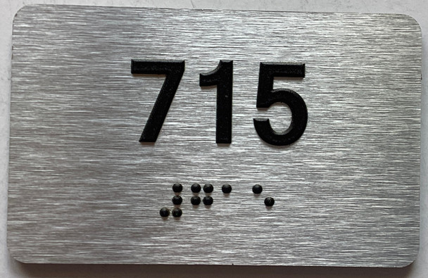 ADA APARTMENT NUMBER 715 SIGN