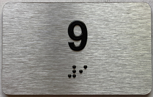 ADA APARTMENT NUMBER 9 SIGN