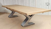 Elegant and adaptable, the Quinn Table transforms dining spaces with its extendable feature.