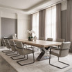 Quinn double extendable boardroom table with timber top and architectural metal base, seating ten in a modern conference room.