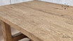 Close-up showing the chunky wood grain design of the table’s top