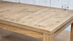 Detailed close-up of the table's oak grain, highlighting the natural beauty of hardwood