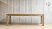 Side view of the 2.5m long Hartford Table, displaying its robust oak build