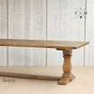 Zoomed-in view of the table's pedestal base, highlighting its sturdy and stylish design