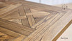 Close-up showing the parquetry design of the table’s top