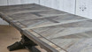 Close-up of the table’s edge finish and parquetry detail