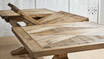 Detailed close-up of the table's extendable mechanism, highlighting the seamless integration of extensions