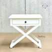 Frontal view focusing on the bedside table's crisp white satin finish