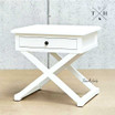 Side view of the bedside table, emphasizing its linear profile and x-base cross-leg detailing.